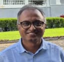 Ravi Kumar Achar, Financial Adviser